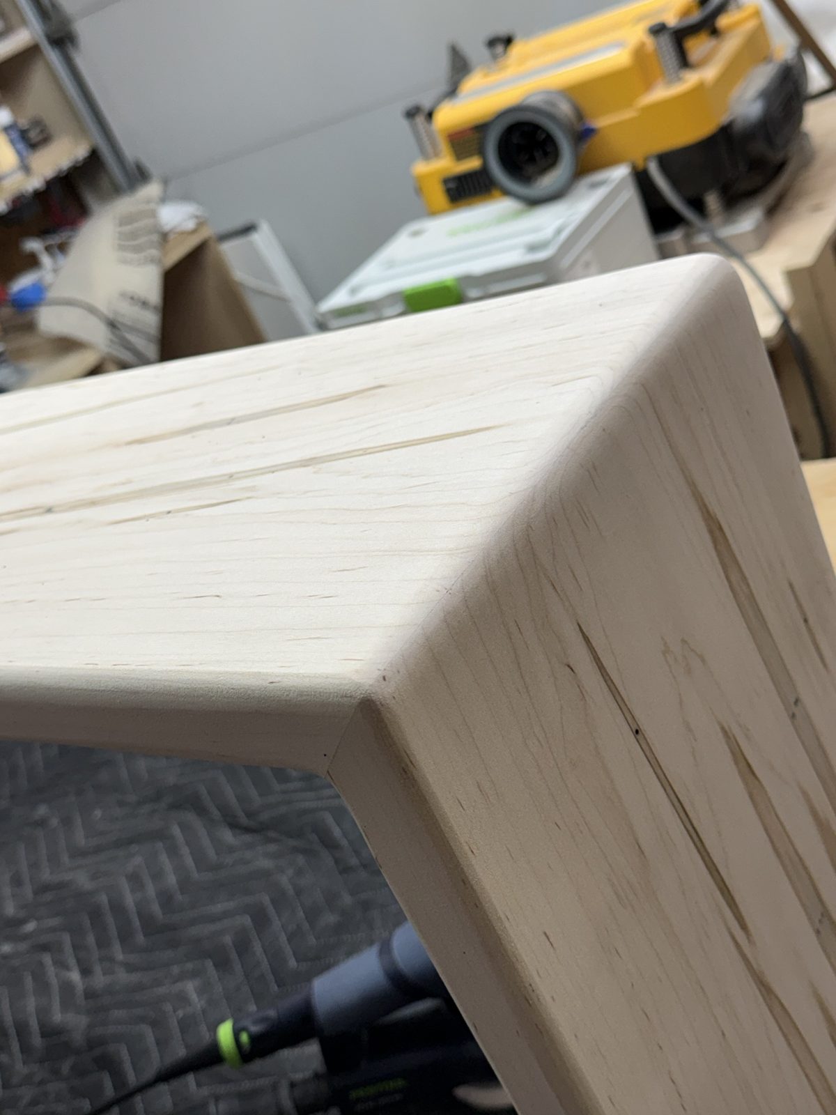 Close detail of the mitred waterfall corner and hand-rounded edge